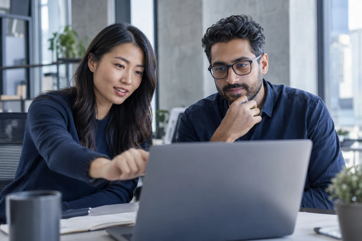 Engineers collaborating in a modern workplace
